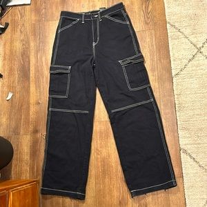 H&M Black jeans with white stiching.